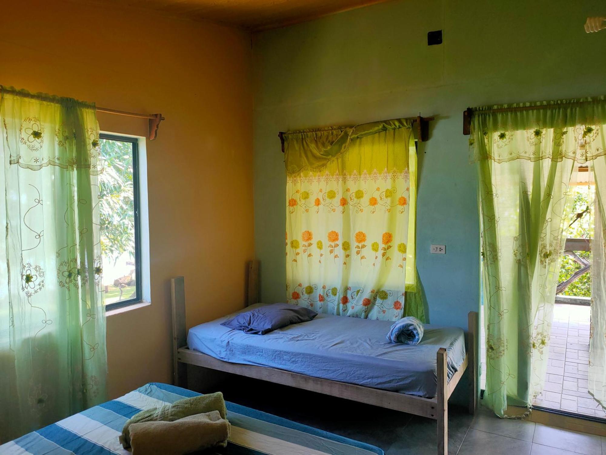 Guesthouse Island Escape South End Kamer foto